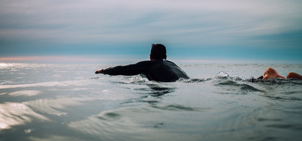 Surfer. (Photo: Tim Marshall/Unsplash)