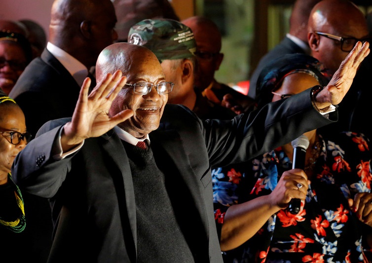  South Africa’s President Jacob Zuma celebrates with his supporters after surviving a no-confidence motion in parliament. Picture: Reuters/Mike Hutchings