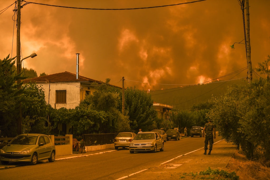 Villagers were ordered to leave their homes on Monday as two separate wildfires damaged houses southeast and west of Athens. File image. 