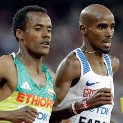Ethiopia's Muktar Edris races alongside Britain's Mo Farah (AP)