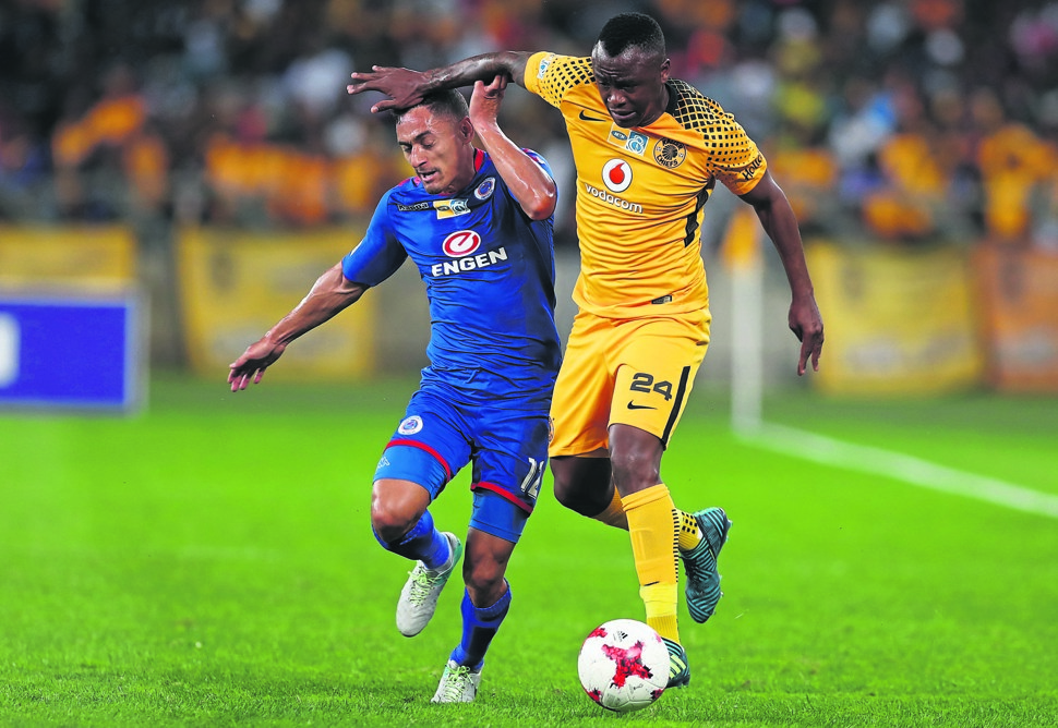 Neck and neck: Cole Alexander of SuperSport United and Tsepo Masilela of Kaizer Chiefs fight for the ball during last night’s MTN8 quarterfinal match. Picture: Gallo Images