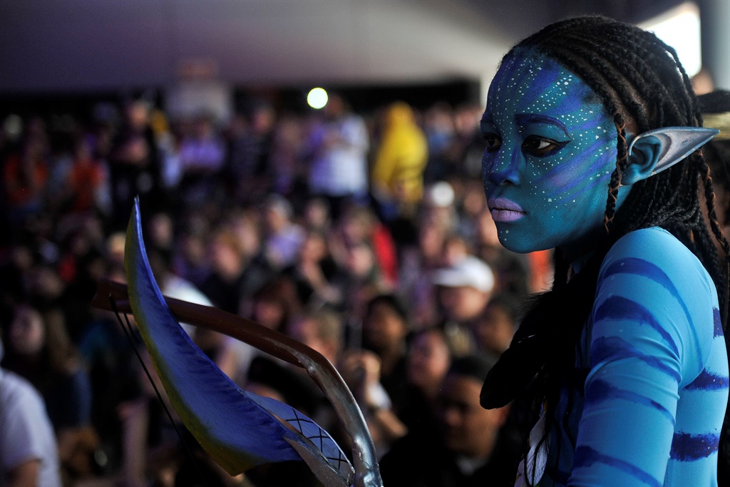 A girl dressed as Neytiri from Avatar observes the cosplay competition at Comic Con Africa at the Kyalami Grand Prix Circuit in Midrand. Thousands of fans dressed in their favourite superheroes flocked to Africa's first Comic Con. Picture: Rosetta Msimango/City Press