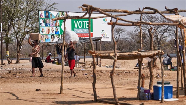 <p>A Zimbabwe Electoral Commission banner is seen at a market in Matabeleland South Province, Zimbabwe on 22 August 2023. </p><p><em>(Photo by Zinyange Auntony/AFP)</em></p>