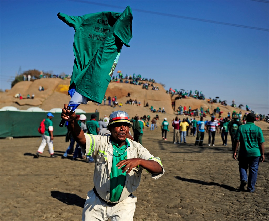 Mine worker dances during the 5th year commemoration of the Marikana masacre.Picture: Tebogo Letsie