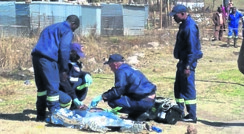 Paramedics at the scene of the shooting incident in Nancefield. 