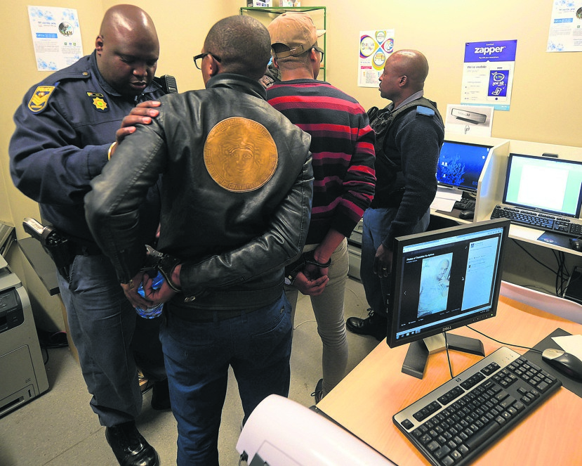 Acting on information received after a tip-off, police raided an internet cafe where suspects were accused of producing fake licences.                      Photos by Trevor Kunene