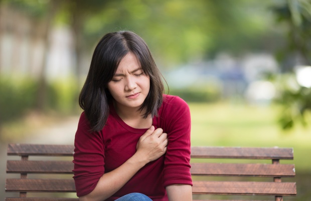 girl with chest pain 