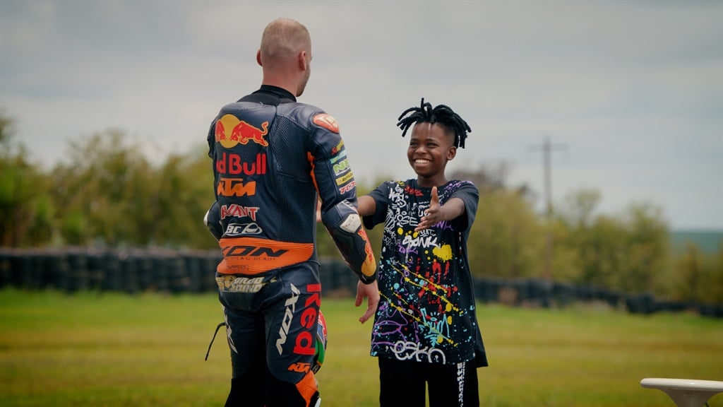 South African MotoGP champion Brad Binder surprising 14-year-old Ora Phiri.