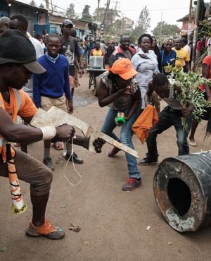 Supporters of Kenya's opposition National Super Alliance celebrate on a street of Kibera slum in Nairob. (AFP) Supporters of Kenya's opposition National Super Alliance celebrate on a street of Kibera slum in Nairob. (AFP)