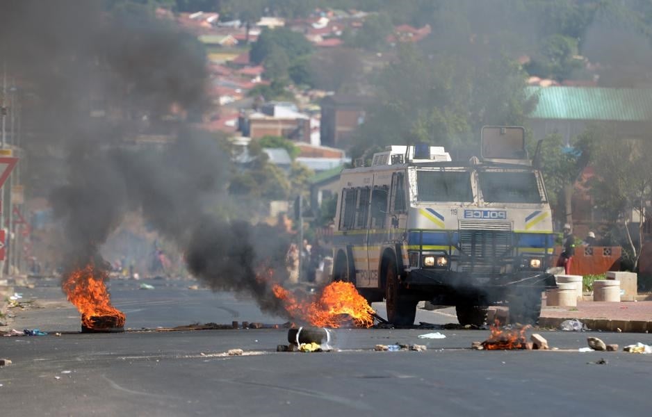 Police fired rubber bullets and tear gas at residents of Westbury who were throwing rocks during a protest. Picture: Felix Dlangamandla/Netwerk24