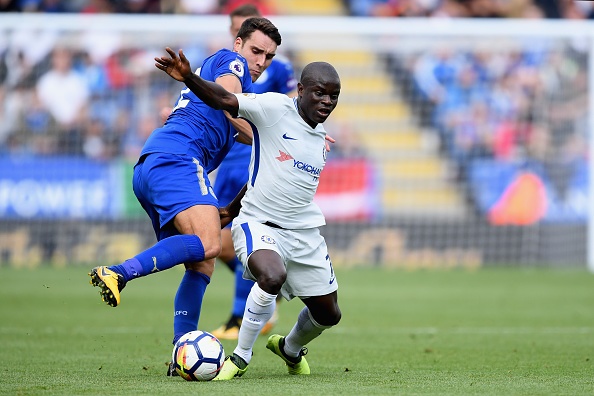 Matty James of Leicester City and N'Golo Kante of Chelsea battle for possession during the Premier League match.