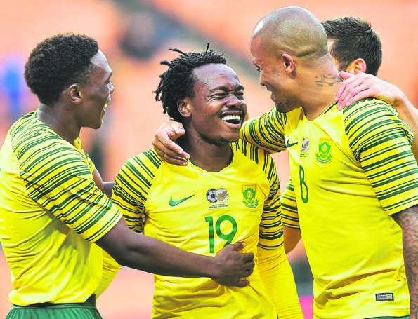 Bafana Bafana A-list players Lebo Mothiba, Percy Tau (centre) and Dino Ndlovu (right) celebrate their massive win against Seychelles at the weekend. Photos byThemba Makofane