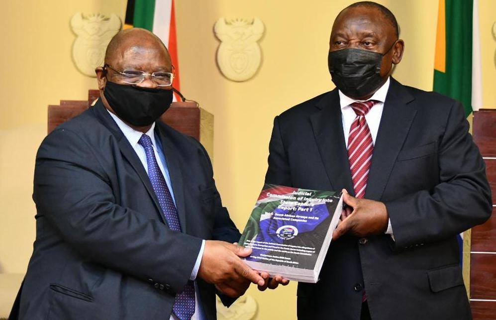 President Cyril Ramaphosa receives the first part of the state capture report from acting Chief Justice Raymond Zondo at the Union Buildings in Pretoria this week . Photo: GCIS