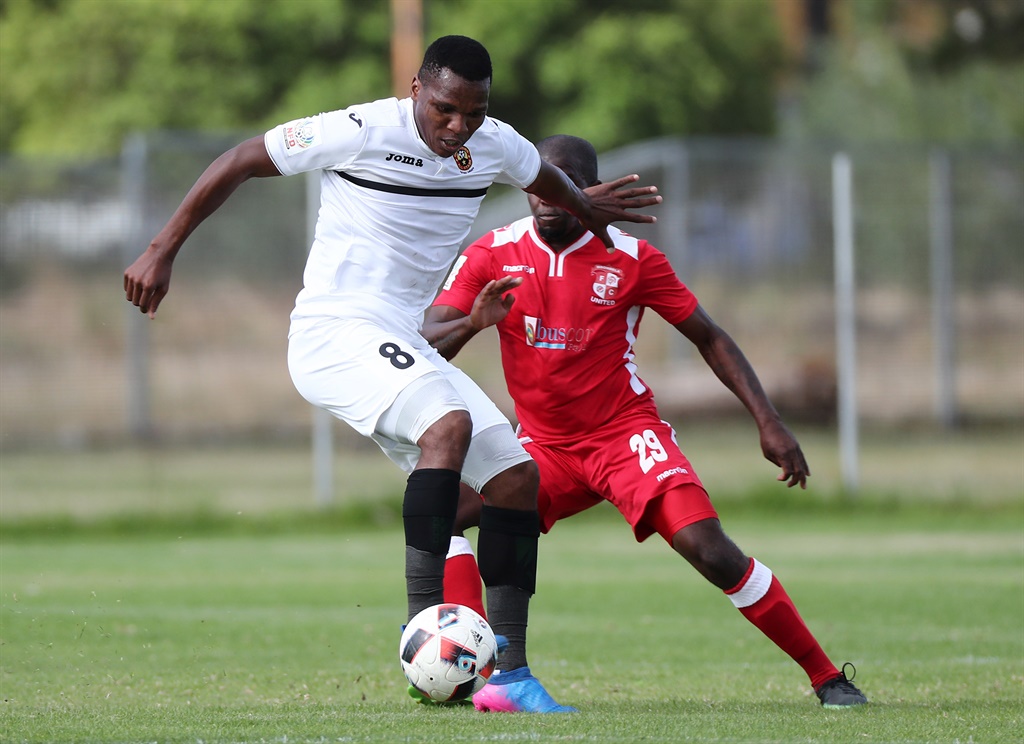 Mlungisi Mbunjana of Cape Town All Stars evades challenge from Clifford Mulenga 