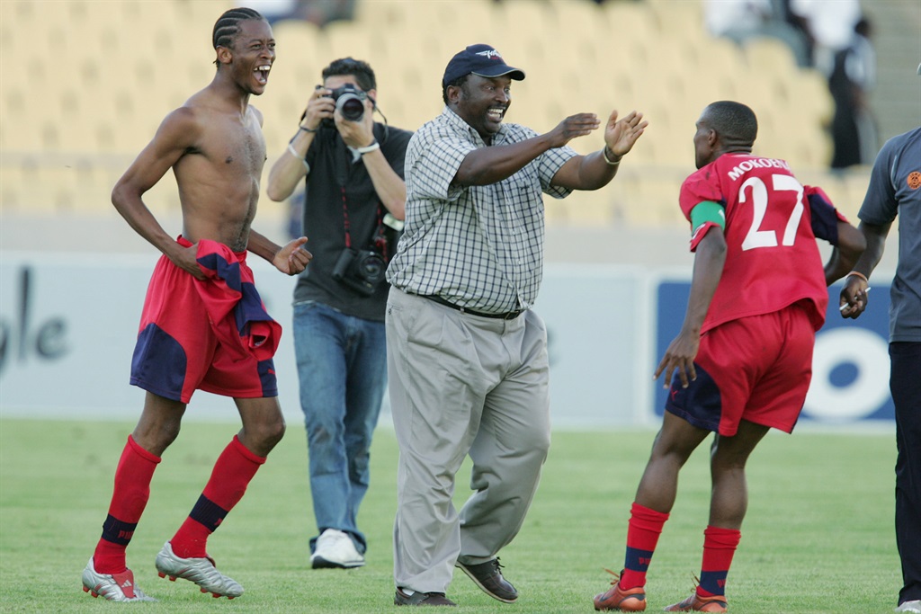 Jomo Sono, Valery Nahayo and Tebogo Mokoena during the 2005 Coca-Cola Cup semi-final between Orlando Pirates and Jomo Cosmos. 