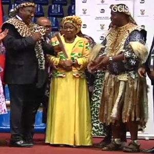 President Cyril Ramaphosa handing over a title deed in KZN