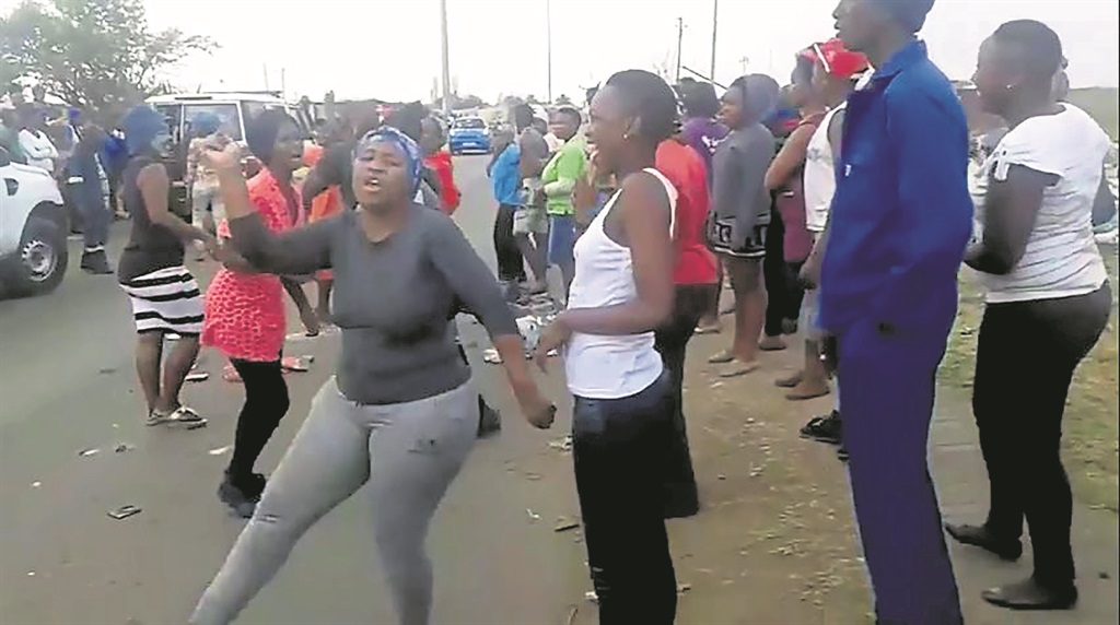 A screengrab shows scores of women protesting in Evaton after a foetus was found dumped there.