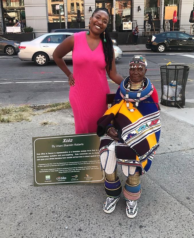 Ester Mahlangu with American artist Imani Roberts, who painted the work titled Xola on the gogo’s behalf. Photo: Instagram