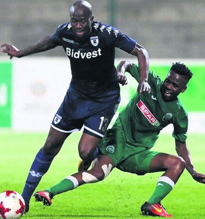 Jabulani Ncobeni of Amazulu (right) challenges Sifiso Hlanti of Bidvest Wits during their Absa Premiership match yesterday night. Photo by Gallo Images