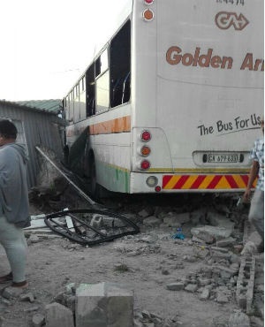 A Golden Arrow bus drove into two homes in Nyanga. Photo supplied.