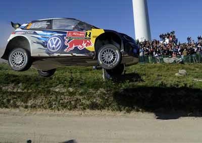 <b>WRC HIGH-FLYERS:</b> VW Motorsport driver Jari-Matti Latvala and co-driver Miikka Anttila achieve severe lift-off during the Portuguese leg of the 2015 World Rally championship on May 24. <i>Image: AP / Paulo Duarte</i>
