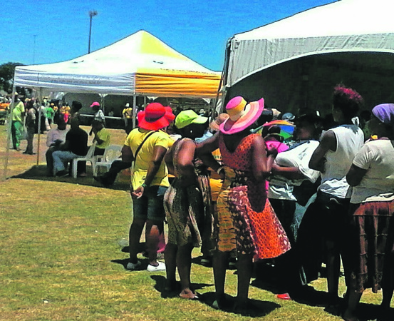 People queue to speak to Sassa officials in KwaZakhele, Port Elizabeth. Photo by Godfrey Sigwela
