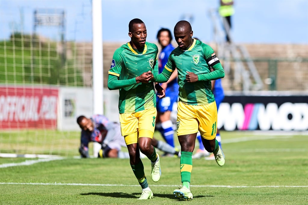 DURBAN, SOUTH AFRICA - JANUARY 07: Divine Lunga of Golden Arrows FC and Nduduzo Sibiya, captain of Golden Arrows FC celebrates the goal during the DStv Premiership match between Golden Arrows and SuperSport United at Princess Magogo Stadium on January 07, 2023 in Durban, South Africa. (Photo by Darren Stewart/Gallo Images)