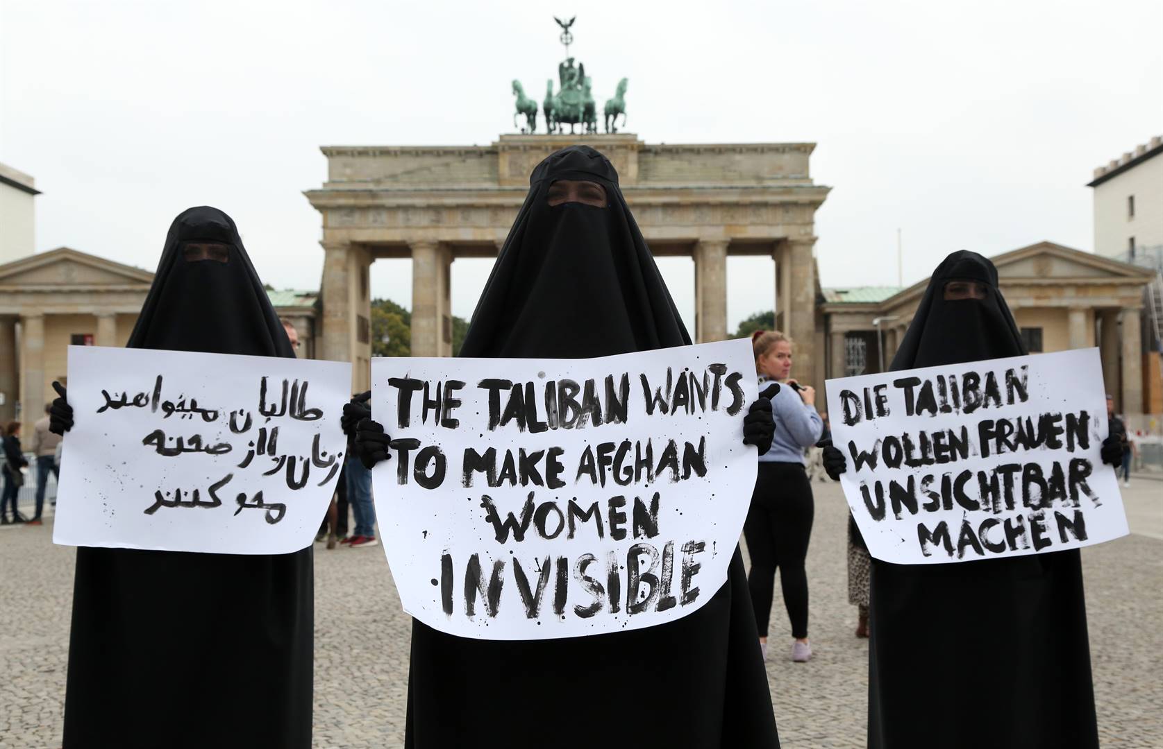 Activists from the feminist group Femen, dressed in burkas, protest in Berlin against the oppression of women in Afghanistan after the takeover of the Taliban in August. Photo: Getty Images