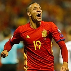 Spain’s Rodrigo celebrates scoring their first goal during their Soccer World Cup qualification match. (Heino Kalis, Reuters)