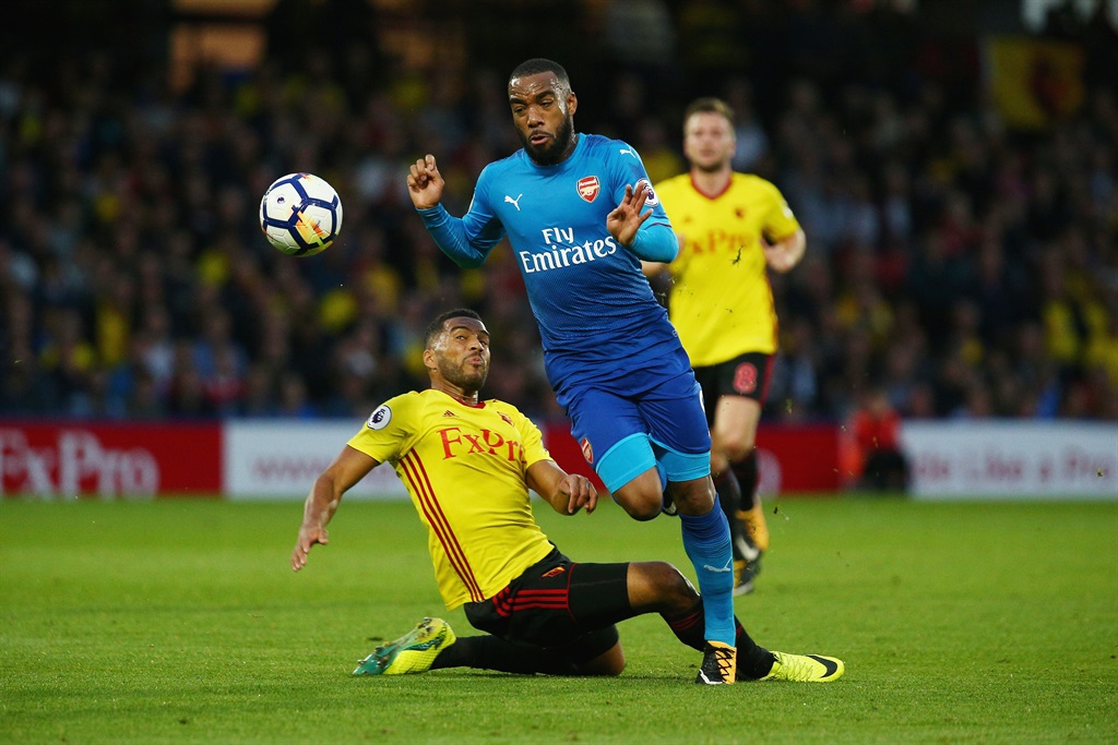 TACKLE Alexandre Lacazette of Arsenal in action during the Premier League match against Watford at Vicarage Road in Watford yesterday. Picture: Charlie Crowhurst/Getty Images