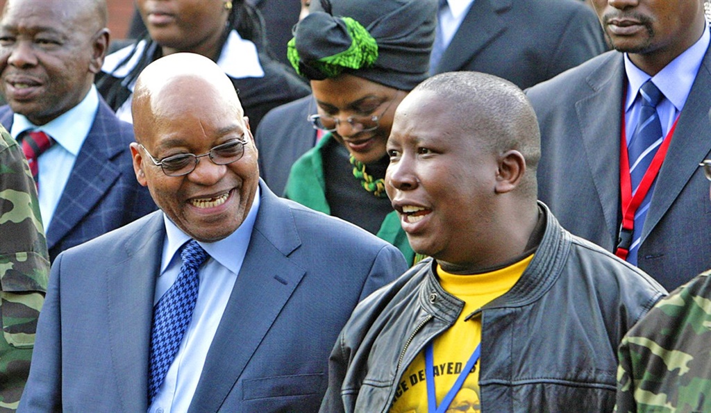 Jacob Zuma (L), leader of South Africa's ruling African National Congress (ANC), chats with Julius Malema,