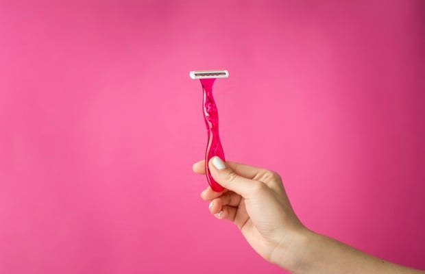 razor on pink background