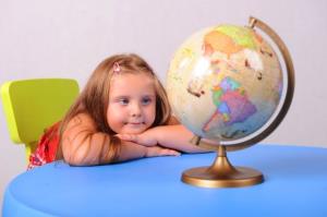 Child earth globe