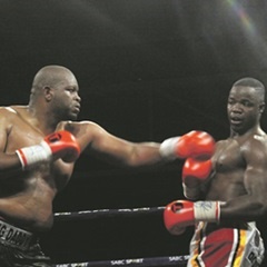 FLABBY:  Osborne Machimana lands a punch on Justice Siliga. (Khothatso Mokone)