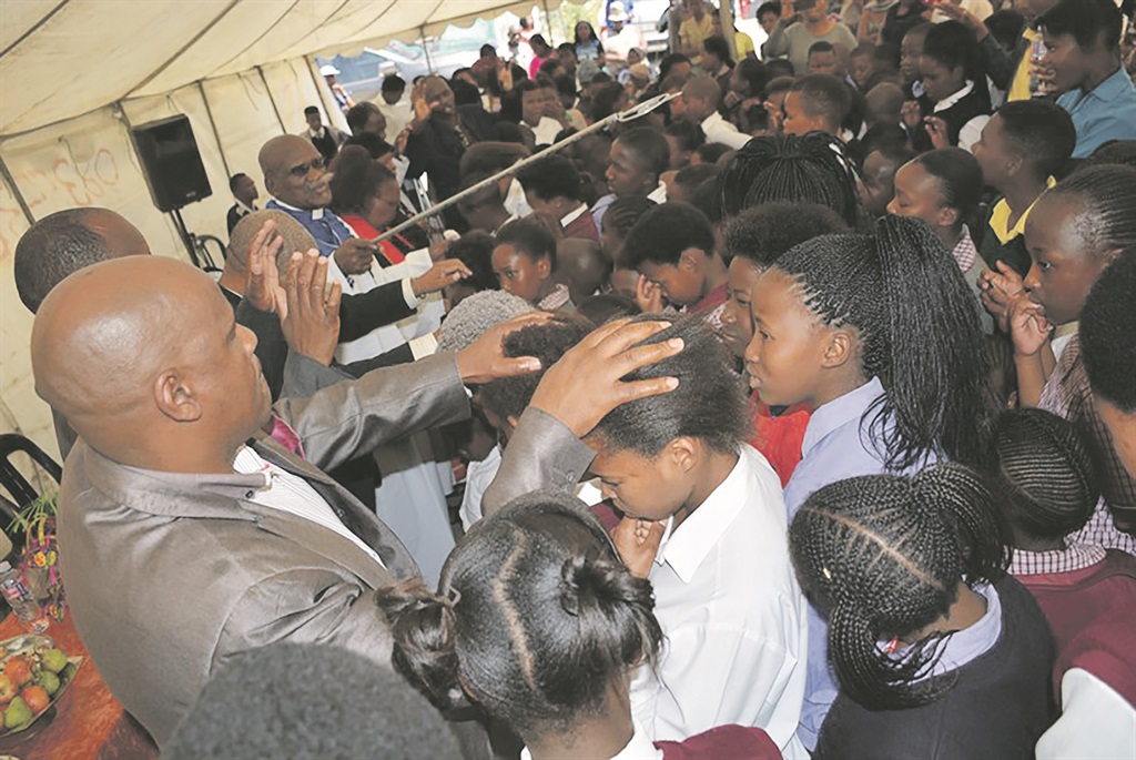 Pastors asked God to protect pupils who don’t use traditional medicine during exam time.       Photo by Lulekwa Mbadamane