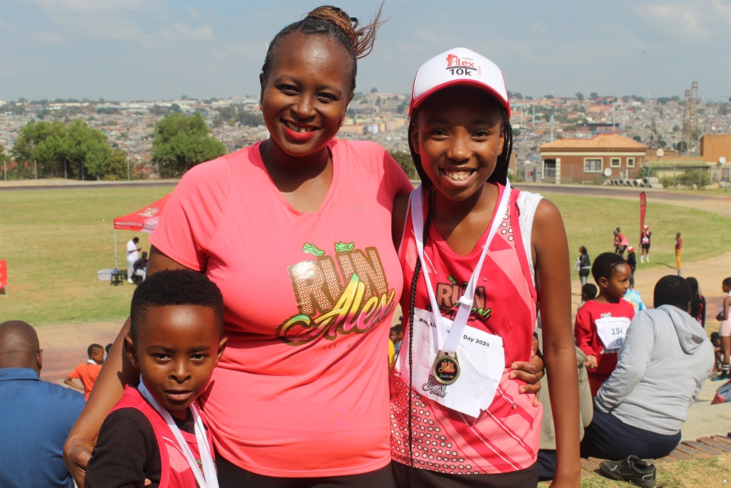 Ofentse Dikgale, 7, Lizzie Dikgale, 35, and Karabo