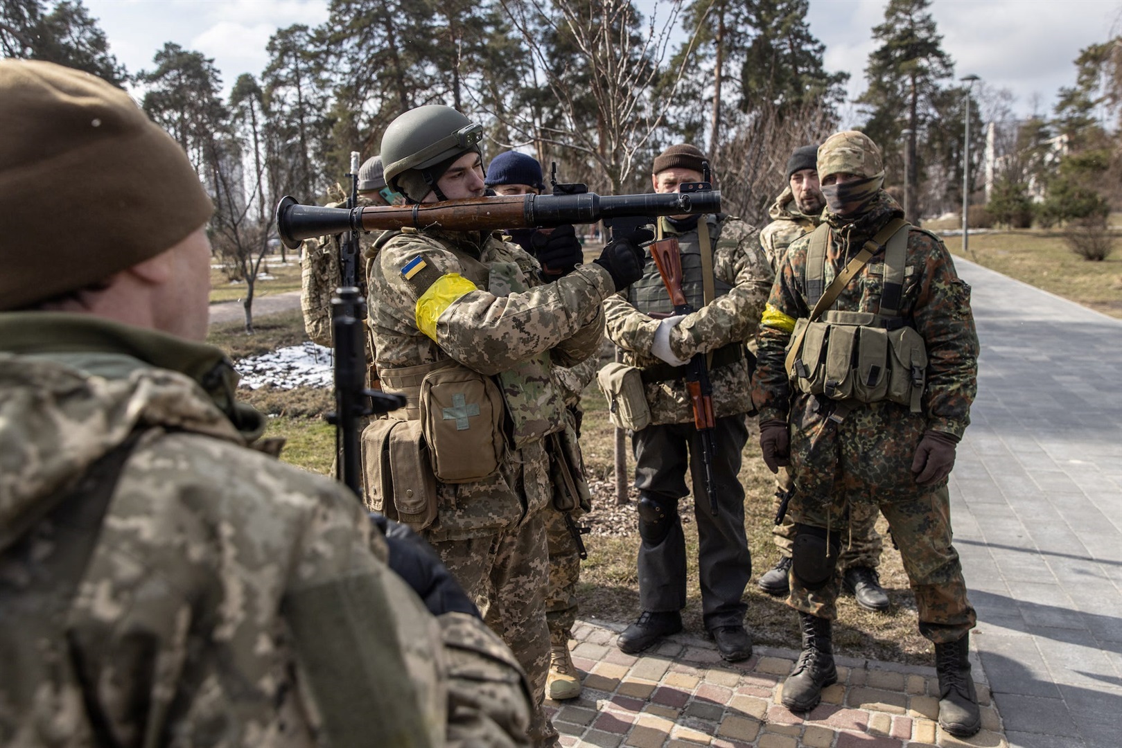 Members of the Territorial Defence Forces learn how to use weapons during a training session held in a public park on March 9, 2022 in Kyiv, Ukraine.