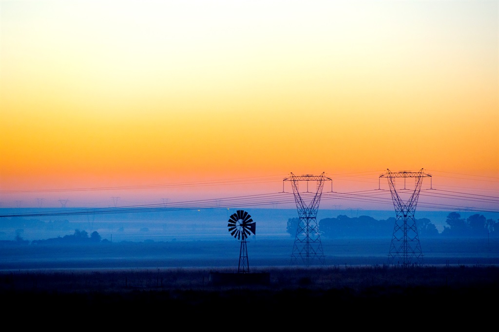 Sunrise over power lines in the Free State. Picture: Herman Verwey