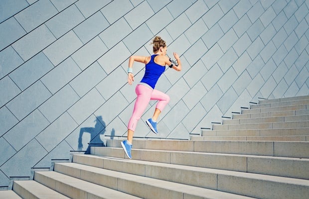 woman running stairs 