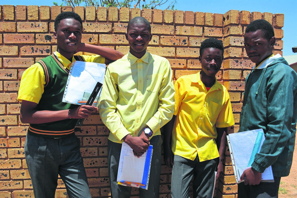 From left: Pule Nkadimeng and his friends at King Makhosoke II Secondary School say geography paper 1 was easy.                       Photo by Bongani Mthimunye 