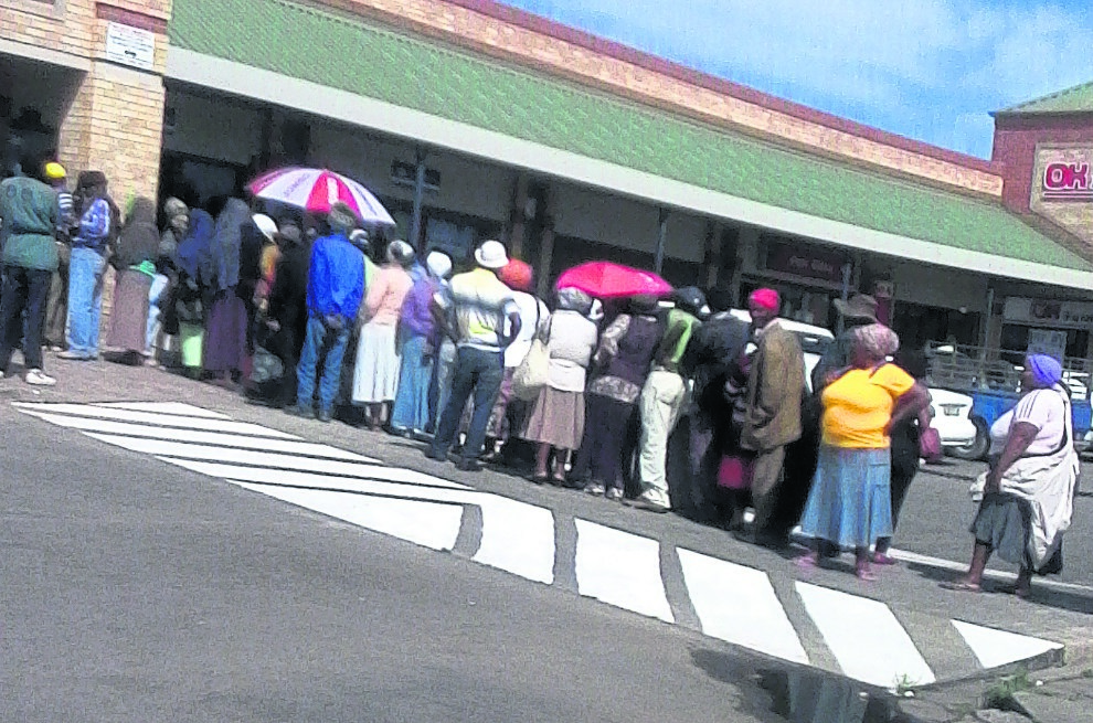 This long queue included Sassa beneficiaries looking for loans in Motherwell, Port Elizabeth. Photo by Godfrey Sigwela