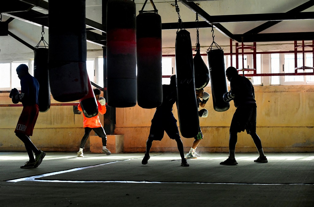Athletes train for boxing at a gymnasium in Havana