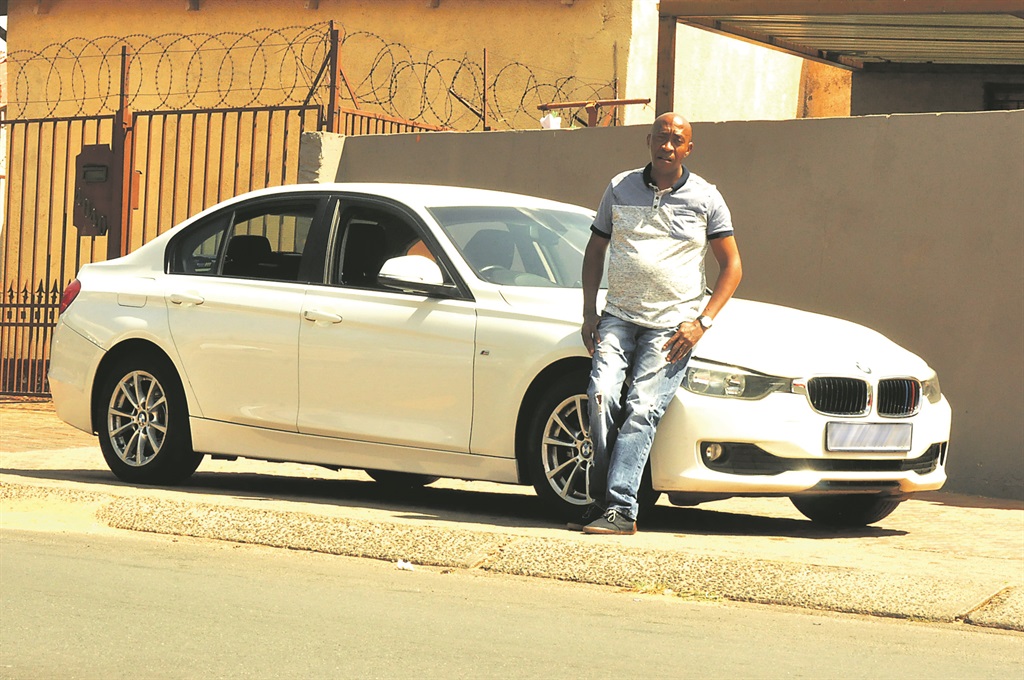Godfrey Moloisane has his dream car.      Photo by Thabo Monama