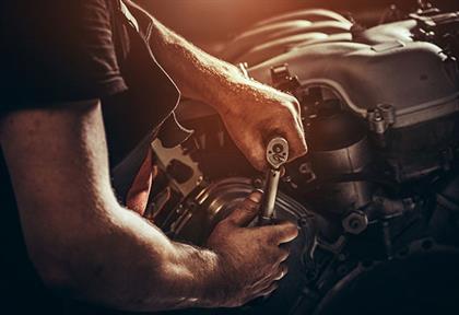 Mechanic repairing an engine
