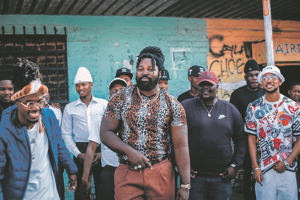 Rappers, Musiholiq, Big Zulu, Zakwe with other artists on set during a music video shoot. Photo from Instagram