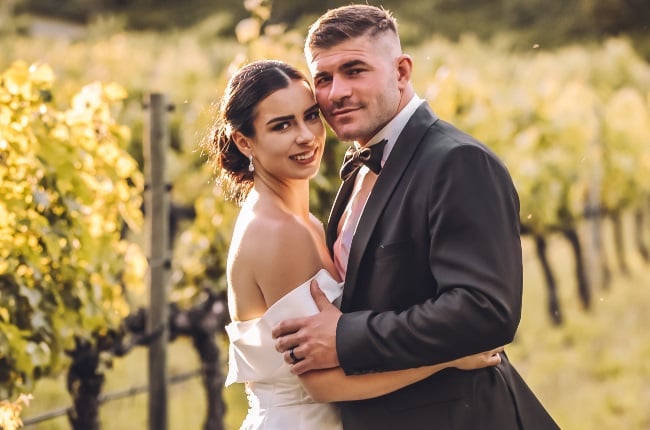 Springbok rugby player Malcolm Marx and Dr Kirsten Grant were officially married on 11 December at a Stellenbosch vineyard. (PHOTO: Estilo Photography)