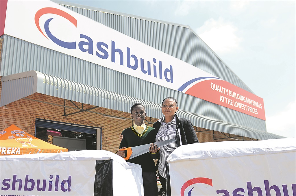 Manager’s Choice Award winner, Ofentse Selepe from Leondale Primary, with the divisional manager of Cashbuild Mini Masala.