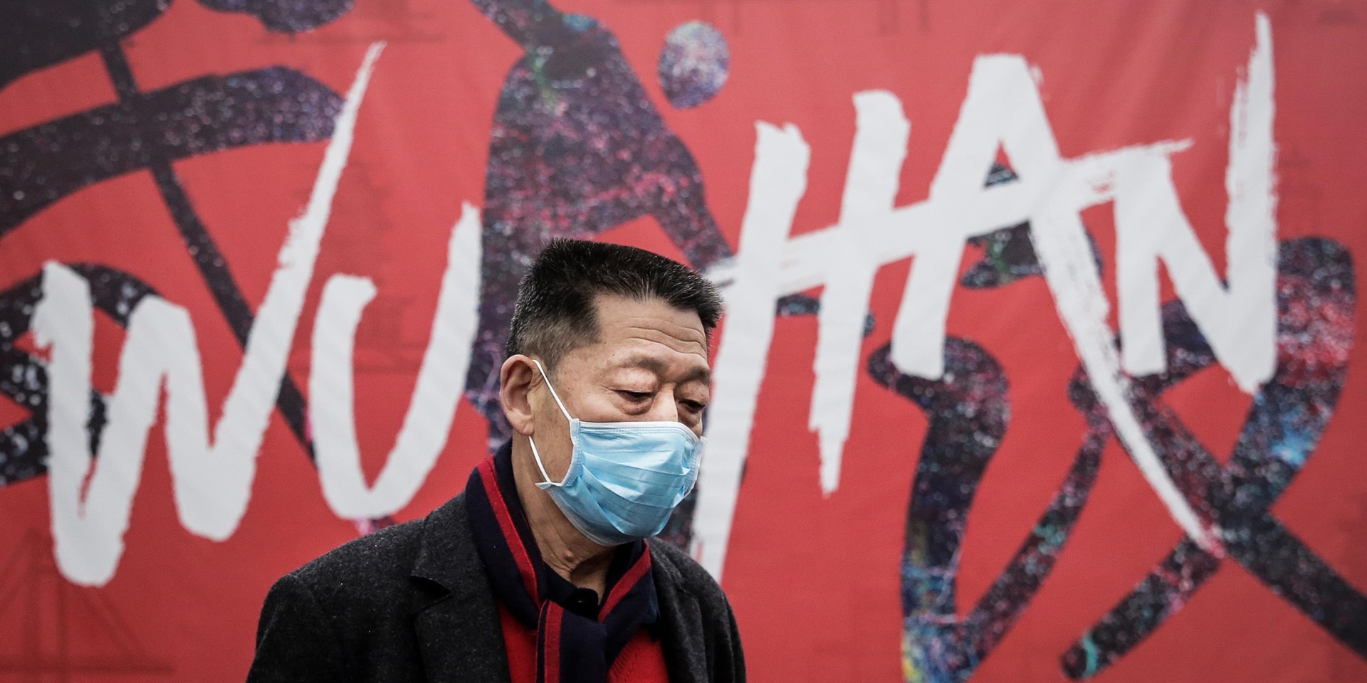 A man wears a mask while walking in the street in Wuhan, Hubei province, China. Picture: Supplied/Getty Images