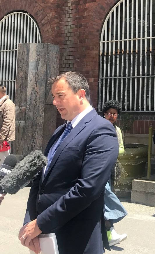 John Steenhuisen, chief whip of the Democratic Alliance, addresses the media outside the Cape Town Police Station after opening a case against State Security Minister Bongani Bongo.