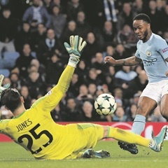 SLIPPING PAST:  Raheem Sterling of Manchester City scores in a Champions League match against Dutch side Feyenoord. (Laurence Griffiths, Getty Images)